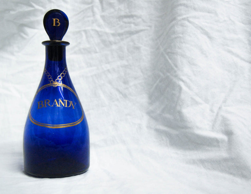 Georgian Bristol Blue Glass Club Shaped Brandy Decanter with Applied Gilt Lettering