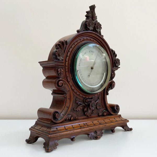 Mid-Victorian Aneroid Barometer in Carved Oak Case by J Hicks of London.