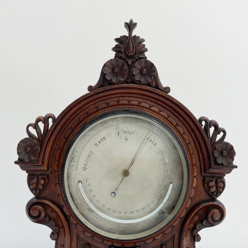 Mid-Victorian Aneroid Barometer in Carved Oak Case by J Hicks of London.